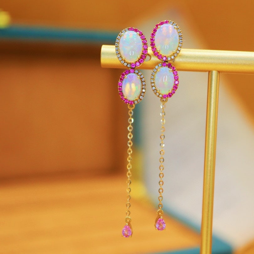 14k Gold 3.04 Ctw Natural Opal & Sapphire Earrings: Ref:231061118 // gold content:14k gold // main gemstone:opal // shape:oval // carat weight:2. 36ct // color:white // treatment:natural // // adjacent gemstone 2 : sapphire // number of stones:44 //
