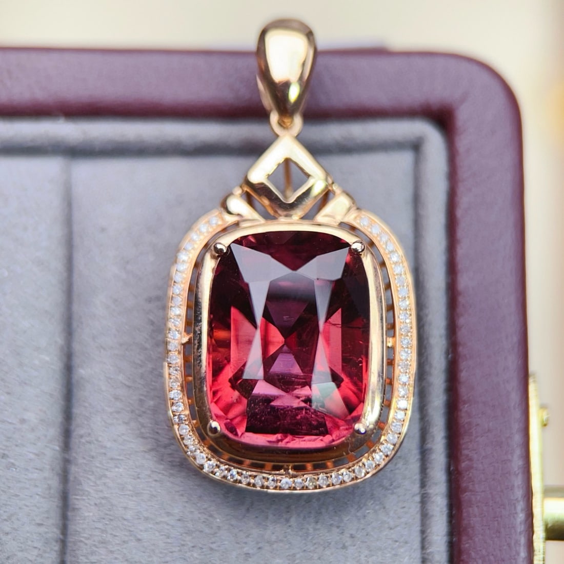 14k Gold 11.68 Ctw Natural Tourmaline & Diamond Pendant( Without Chain ): Ref:231061135 // gold content:14k gold // main gemstone:tourmaline // shape:cushion // carat weight:11. 5ct // color:red // treatment:natural // // adjacent gemstone 2 : diamond // number of