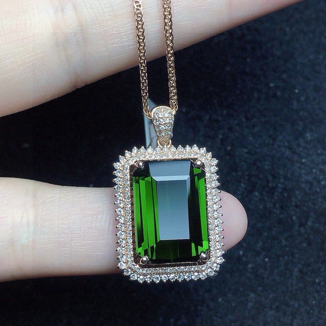 14k Gold 11 Ct Natural Tourmaline & Diamond Pendant( Without Chain ): Ref:231061136 // gold content:14k gold // main gemstone:tourmaline // shape:octagonal // carat weight:11ct // color:green // treatment:natural // // adjacent gemstone 2 : diamond // shape:round //