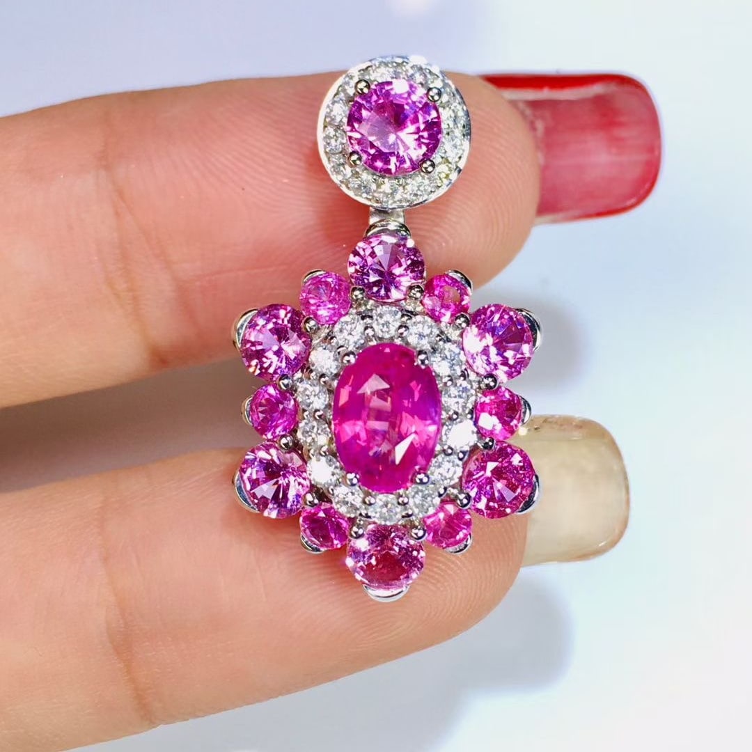 14k Gold 1.51 Ctw Natural Padparadscha Sapphire & Diamond Pendant( Without Chain ): Ref:231061193 // gold content:14k gold // main gemstone:padparadscha sapphire // shape:oval // carat weight:1. 09ct // color:pink // treatment:natural // // adjacent gemstone 2 : diamond //
