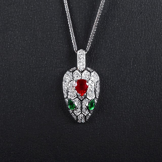 14k Gold 0.52 Ctw Natural Ruby & Tsavorite Pendant( Without Chain ): Ref:231061239 // gold content:14k gold // main gemstone:ruby // shape:pear // carat weight:0. 36ct // color:red // treatment:natural // // adjacent gemstone 2 : tsavorite // number of stones:2 //