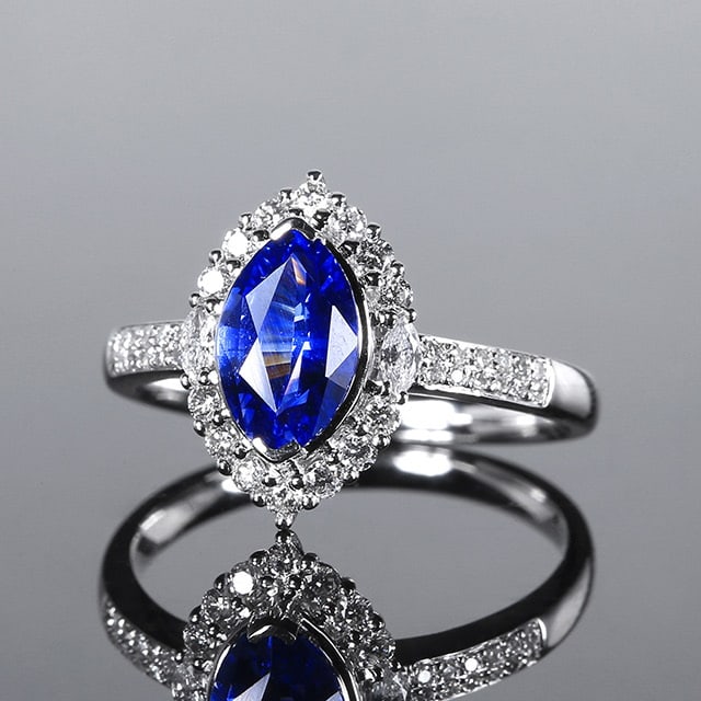 14k Gold 1.97 Ctw Natural Sapphire & Diamond Ring: Ref:231062059 // gold content:14k gold // ring size:7. 25us // // main gemstone:sapphire // shape:marquise // carat weight:1. 62ct // color:cornflower blue // treatment:natural // // adjacent