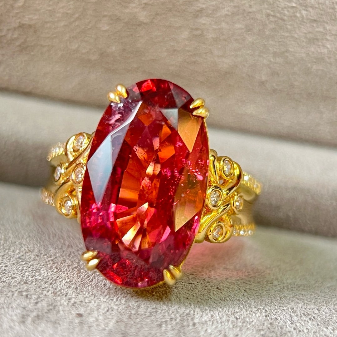 14k Gold 8.17 Ctw Natural Tourmaline & Diamond Ring: Ref:231062068 // gold content:14k gold // ring size:7. 25us // // main gemstone:tourmaline // shape:oval // carat weight:8. 03ct // color:red // treatment:natural // // adjacent gemstone 2 :