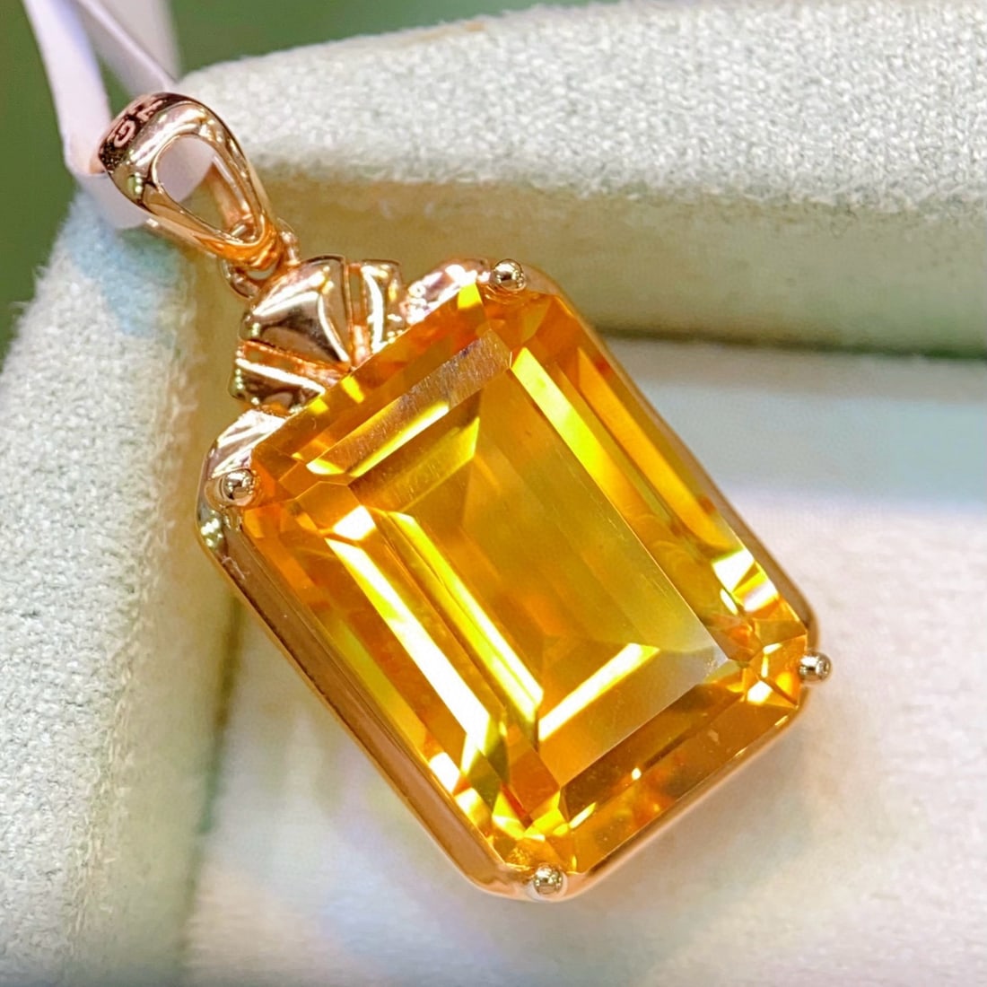 14k Gold 7.7 Ct Natural Citrine Pendant( Without Chain ): Ref:231062104 // gold content:14k gold // main gemstone:citrine // shape:octagonal // carat weight:7. 7ct // color:yellow // treatment:natural // Condition: NewLow Estimate: 1700.00High Estimate: