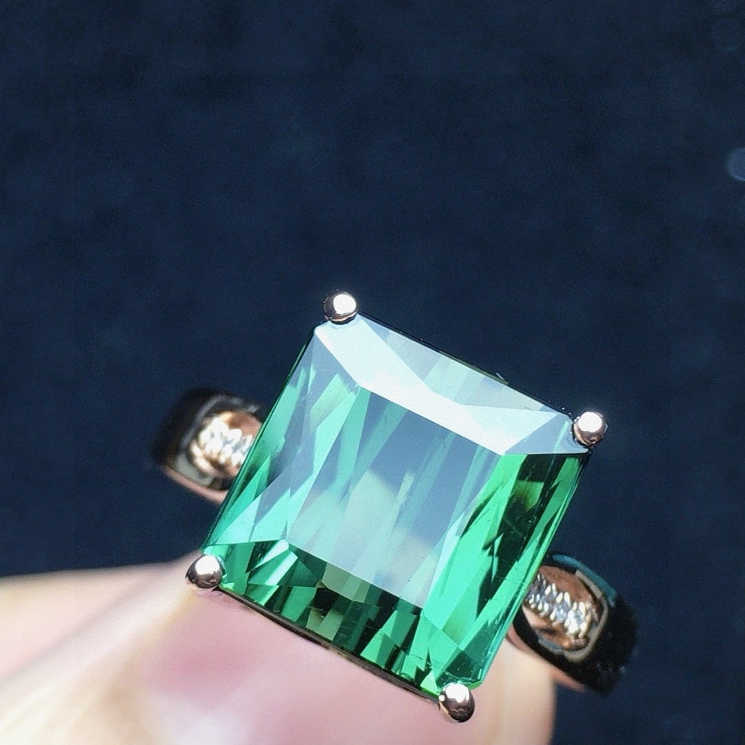 14k Gold 5.1 Ct Natural Tourmaline & Diamond Ring: Ref:231062109 // gold content:14k gold // ring size:7. 25us // // main gemstone:tourmaline // shape:octagonal // carat weight:5. 1ct // color:green // treatment:natural // // adjacent gemstone 2 :