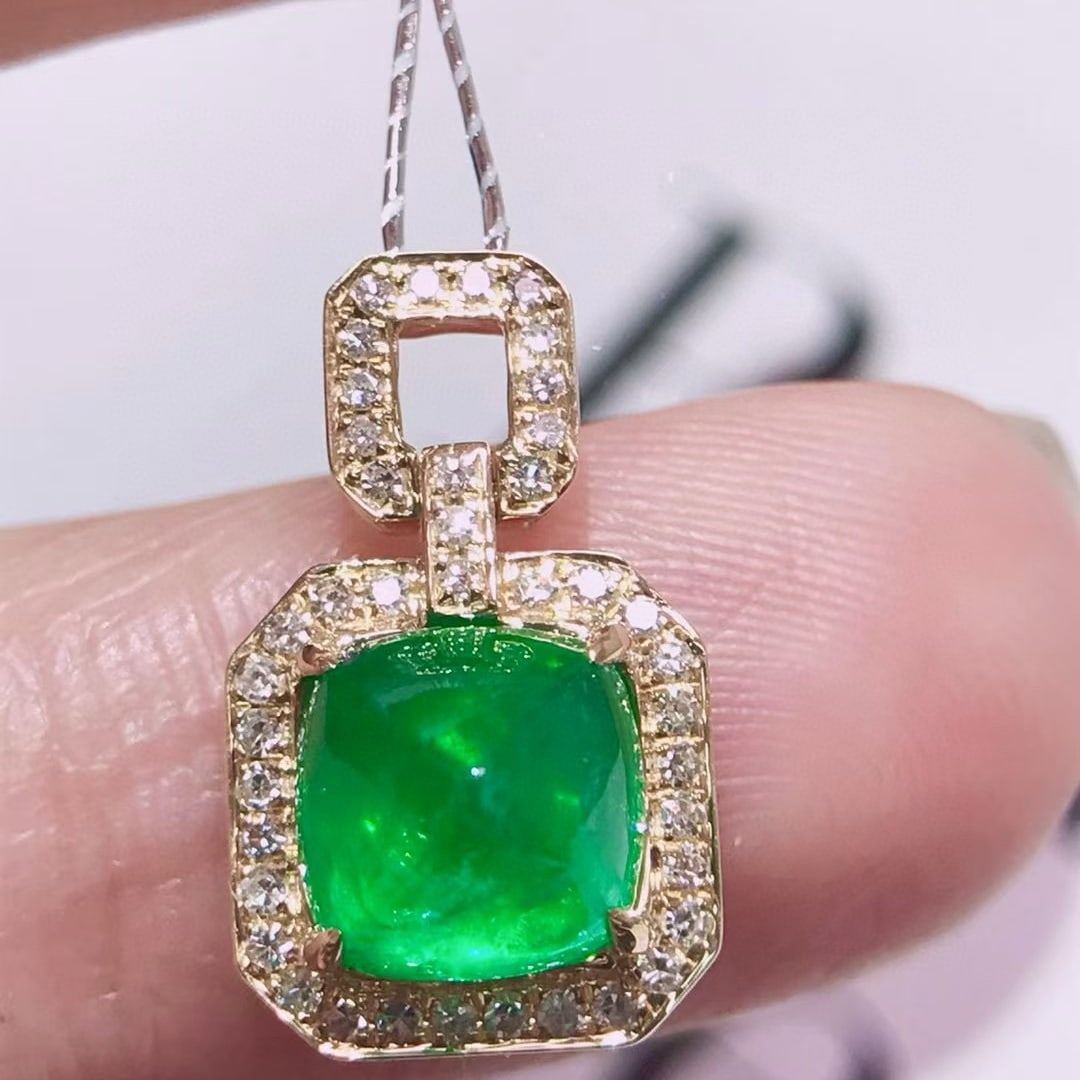 14k Gold 2.05 Ctw Natural Emerald & Diamond Pendant( Without Chain ): Ref:231062166 // gold content:14k gold // main gemstone:emerald // shape:sugar-loaf // carat weight:1. 85ct // color:green // treatment:natural // // adjacent gemstone 2 : diamond // shape:round //