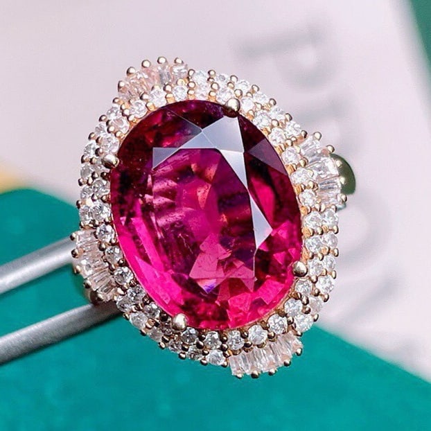 14k Gold 7.26 Ct Natural Tourmaline & Diamond Ring: Ref:231062167 // gold content:14k gold // ring size:7. 25us // // main gemstone:tourmaline // shape:oval // carat weight:7. 26ct // color:red // treatment:natural // // adjacent gemstone 2 :