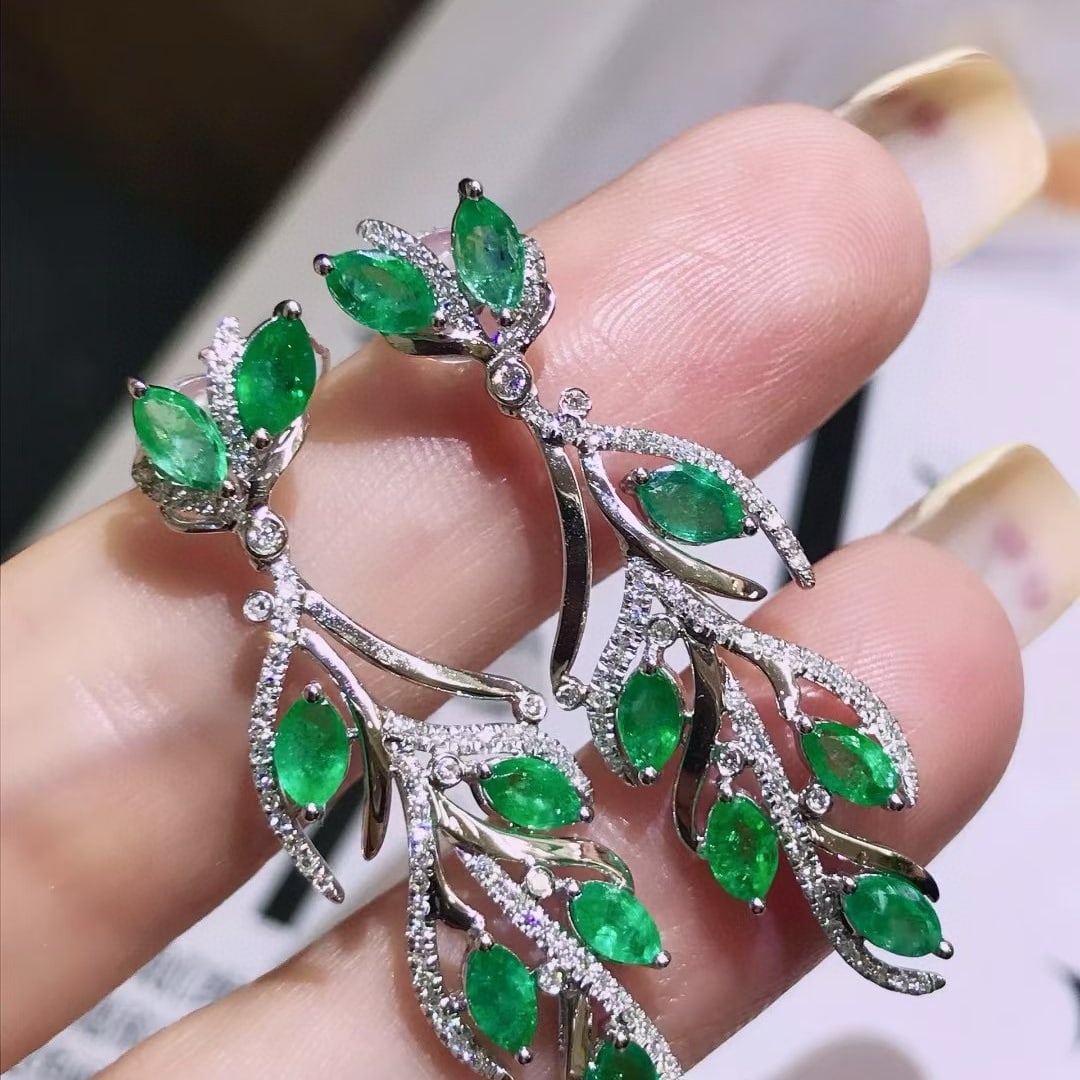 14k Gold 3.28 Ctw Natural Emerald & Diamond Earrings: Ref:231062171 // gold content:14k gold // main gemstone:emerald // shape:marquise // carat weight:2. 7ct // color:green // treatment:natural // // adjacent gemstone 2 : diamond // shape:round //