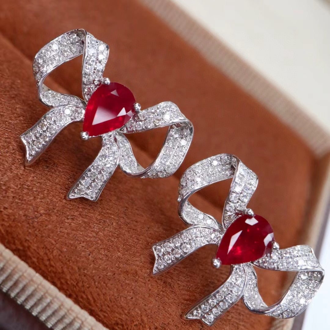 14k Gold 1.70 Ctw Natural Ruby & Diamond Earrings: Ref:231062229 // gold content:14k gold // main gemstone:ruby // shape:pear // carat weight:1. 18ct // color:pigeonblood red // treatment:natural // // adjacent gemstone 2 : diamond // shape:round // c