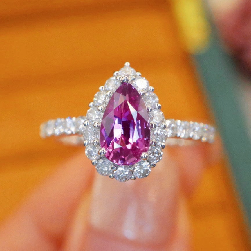 14k Gold 1.78 Ctw Natural Sapphire & Diamond Ring: Ref:231062312 // gold content:14k gold // ring size:7. 25us // // main gemstone:sapphire // shape:pear // carat weight:1. 00ct // color:purple // treatment:natural // // adjacent gemstone 2 : diamond