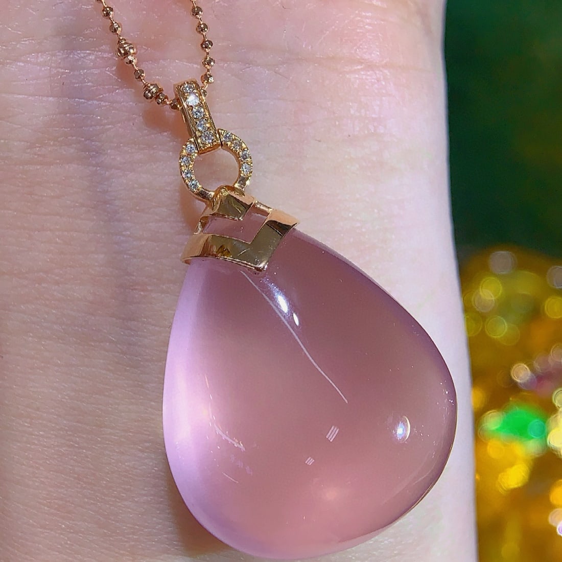 14k Gold 10.23 Ct Natural Rose Quartz & Diamond Pendant( Without Chain ): Ref:231062326 // gold content:14k gold // main gemstone:rose quartz // shape:pear // carat weight:10. 23ct // color:pink // treatment:natural // // adjacent gemstone 2 : diamond // number of
