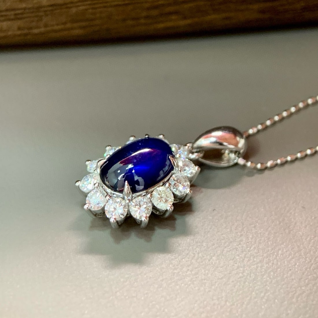 14k Gold 2.65 Ctw Natural Sapphire & Diamond Pendant( Without Chain ): Ref:231062327 // gold content:14k gold // main gemstone:sapphire // shape:oval // carat weight:1. 97ct // color:blue // treatment:natural // // adjacent gemstone 2 : diamond // shape:round // carat