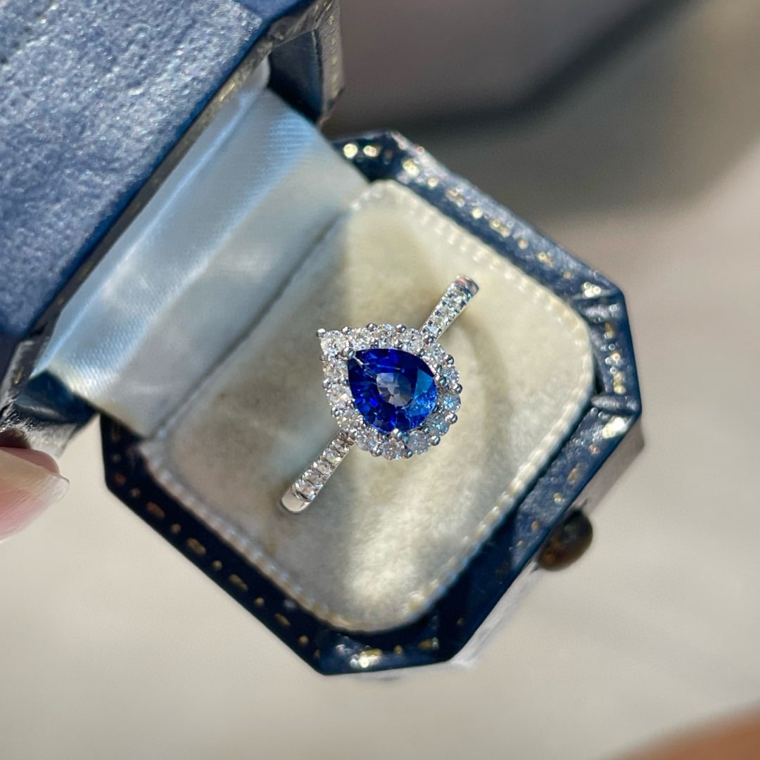 14k Gold 0.50 Ct Natural Sapphire & Diamond Ring: Ref:231062374 // gold content:14k gold // ring size:7. 25us // // main gemstone:sapphire // shape:pear // carat weight:0. 50ct // color:royal blue // treatment:natural // // adjacent gemstone 2 : diam