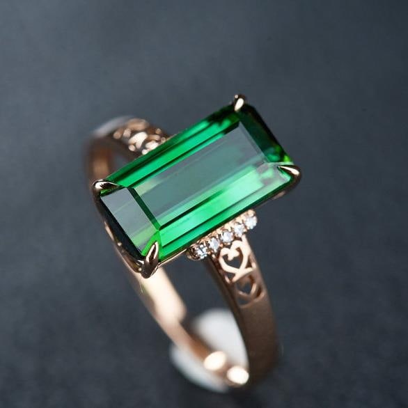 14k Gold 3.0 Ct Natural Tourmaline & Diamond Ring: Ref:231191018 // gold content:14k gold // ring size:7. 25us // // main gemstone:tourmaline // shape:octagonal // carat weight:3. 0ct // color:green // treatment:natural // // adjacent gemstone 2 : dia