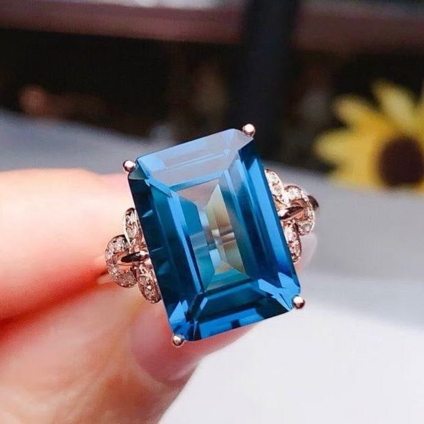 14k Gold 8.15 Ct Natural Topaz & Diamond Ring: Ref:231191054 // gold content:14k gold // ring size:7. 25us // // main gemstone:topaz // shape:octagonal // carat weight:8. 15ct // color:blue // treatment:natural // // adjacent gemstone 2 : diamond 