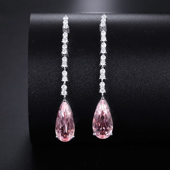 14k Gold 3.70 Ctw Natural Morganite & Diamond Earrings: Ref:231191063 // gold content:14k gold // main gemstone:morganite // shape:pear // carat weight:3. 27ct // color:pink // treatment:natural // // adjacent gemstone 2 : diamond // shape:round // carat