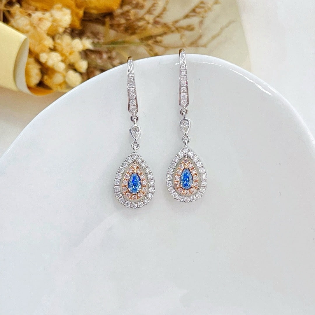 14k Gold 0.62 Ctw Natural Blue Diamond & Diamond Earrings: Ref:231191093 // gold content:14k gold // main gemstone:blue diamond // shape:pear // carat weight:0. 16ct // color:blue // treatment:natural // // adjacent gemstone 2 : diamond // shape:round // cara