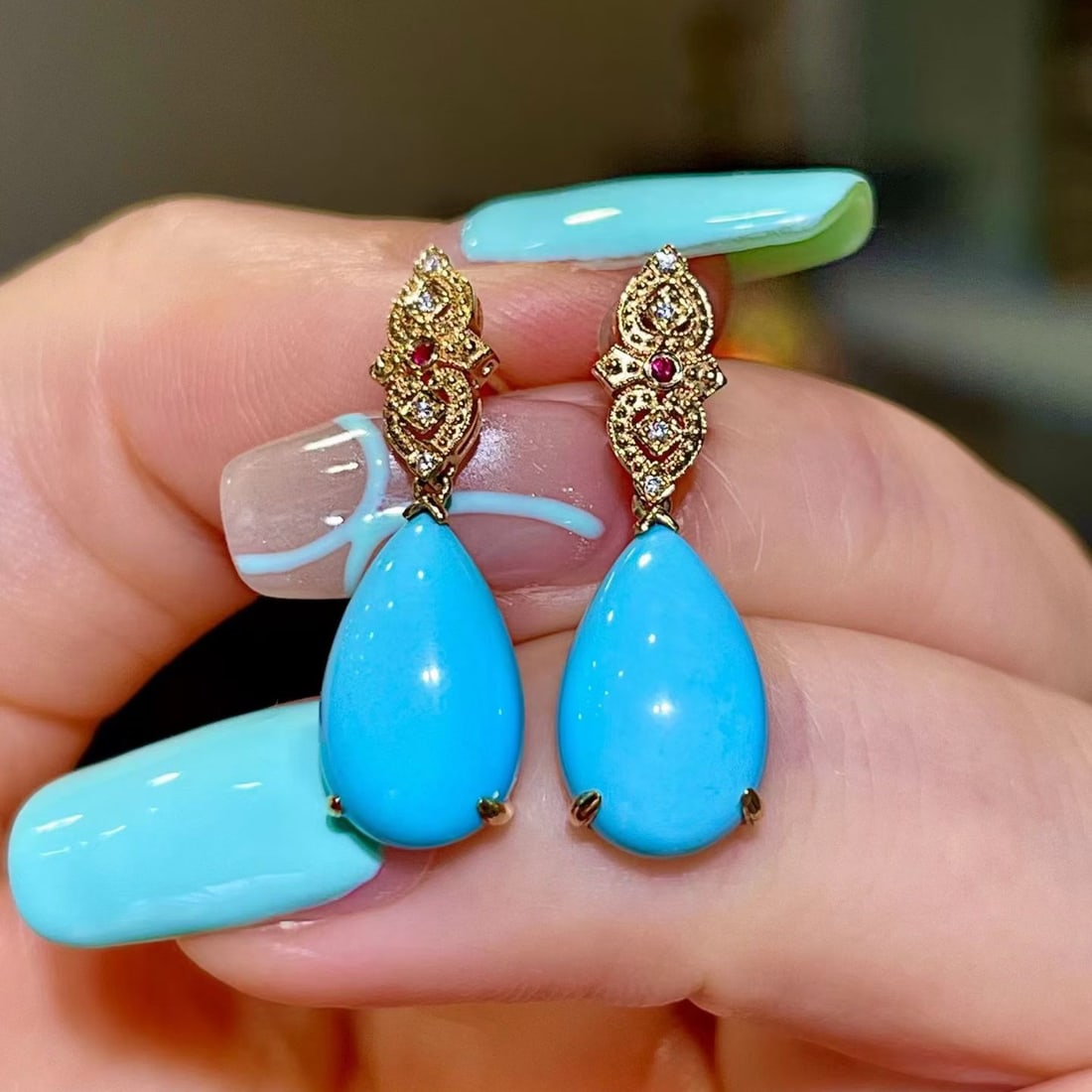 14k Gold 5.68 Ct Natural Blue Turquoise & Ruby & Diamond Earrings: Ref:231191112 // gold content:14k gold // main gemstone:blue turquoise // shape:pear // carat weight:5. 68ct // color:blue // treatment:natural // // adjacent gemstone 2 : ruby // shape:round // color