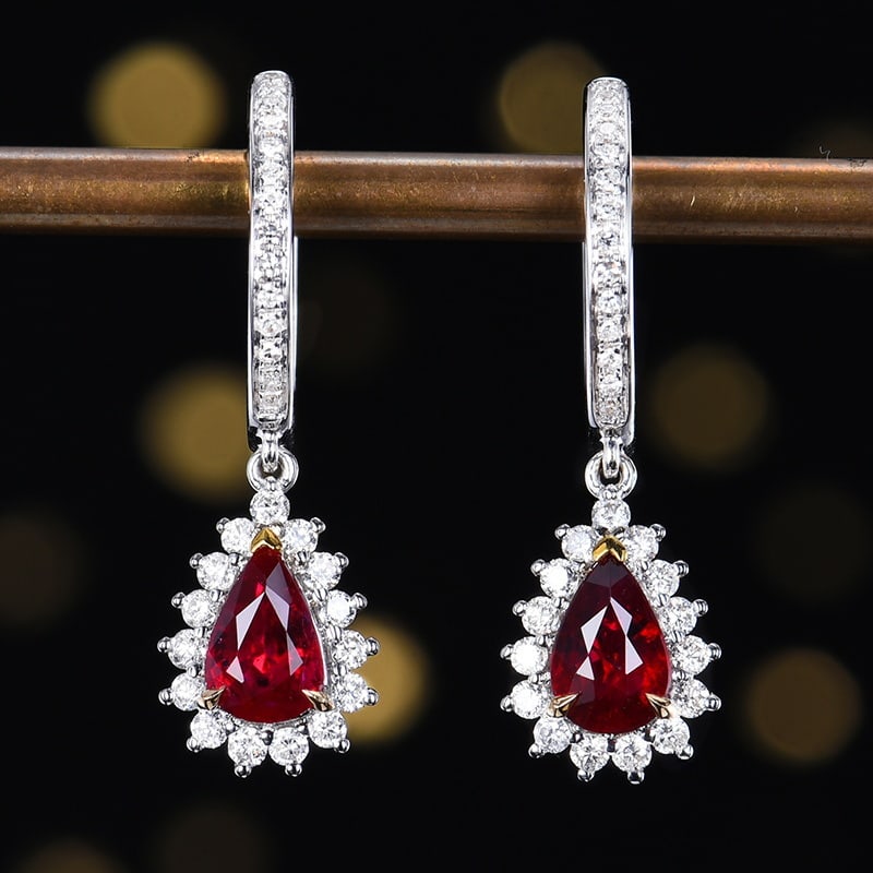 14k Gold 1.32 Ctw Natural Ruby & Diamond Earrings: Ref:231191128 // gold content:14k gold // main gemstone:ruby // shape:pear // carat weight:0. 95ct // color:pigeonblood red // treatment:natural // // adjacent gemstone 2 : diamond // number of stones