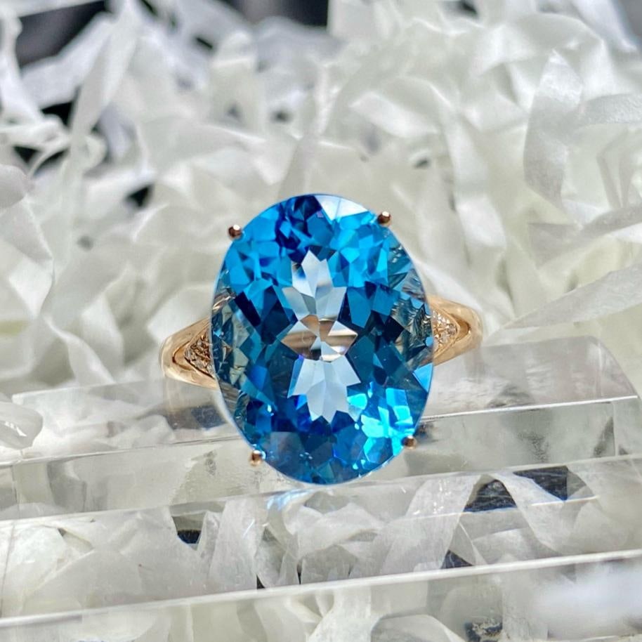 14k Gold 9.25 Ct Natural Topaz & Diamond Ring: Ref:231191148 // gold content:14k gold // ring size:7. 25us // // main gemstone:topaz // shape:oval // carat weight:9. 25ct // color:blue // treatment:natural // // adjacent gemstone 2 : diamond //
