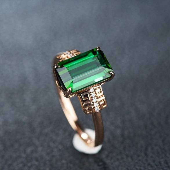 14k Gold 3.0 Ct Natural Tourmaline & Diamond Ring: Ref:231191151 // gold content:14k gold // ring size:7. 25us // // main gemstone:tourmaline // shape:octagonal // carat weight:3. 0ct // color:green // treatment:natural // // adjacent gemstone 2 : dia