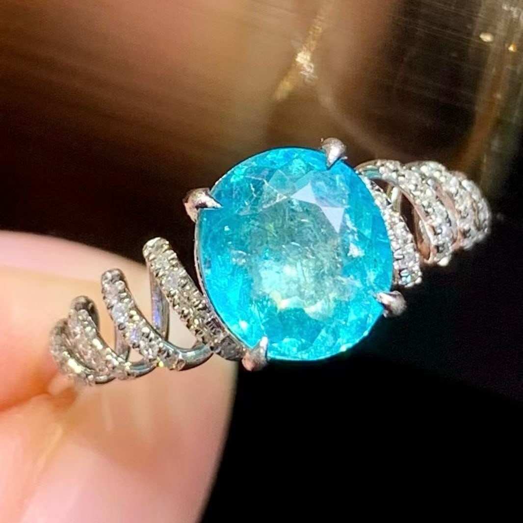 14k Gold 1.6 Ct Natural Paraiba Tourmaline & Diamond Ring: Ref:231191246 // gold content:14k gold // ring size:7. 25us // // main gemstone:paraiba tourmaline // shape:oval // carat weight:1. 6ct // color:blue // treatment:natural // // adjacent gemstone 2 :
