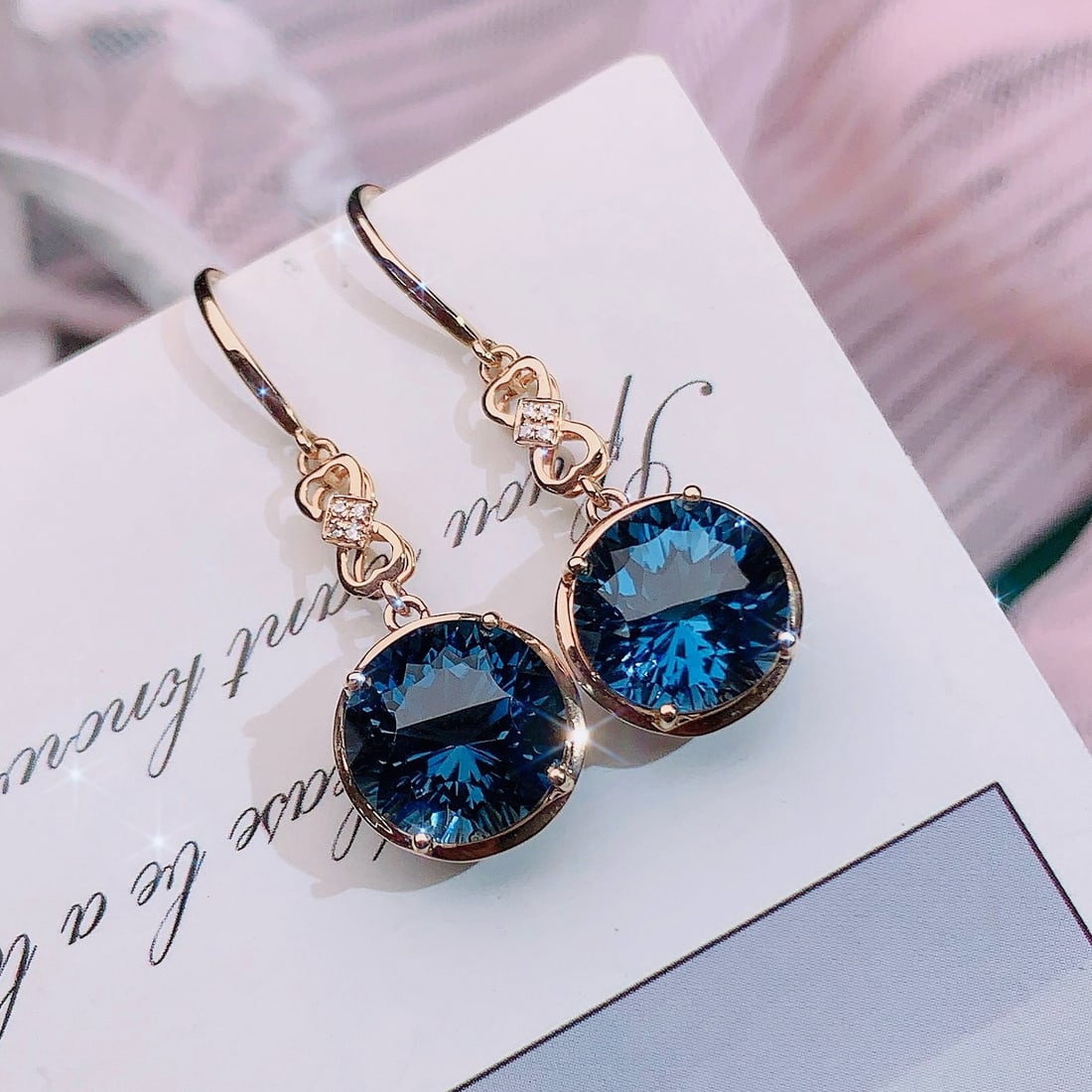 14k Gold 9.7 Ct Natural Topaz & Diamond Earrings: Ref:231192016 // gold content:14k gold // main gemstone:topaz // shape:round // carat weight:9. 7ct // color:blue // treatment:natural // cut grade:g // // adjacent gemstone 2 : diamond // number of s