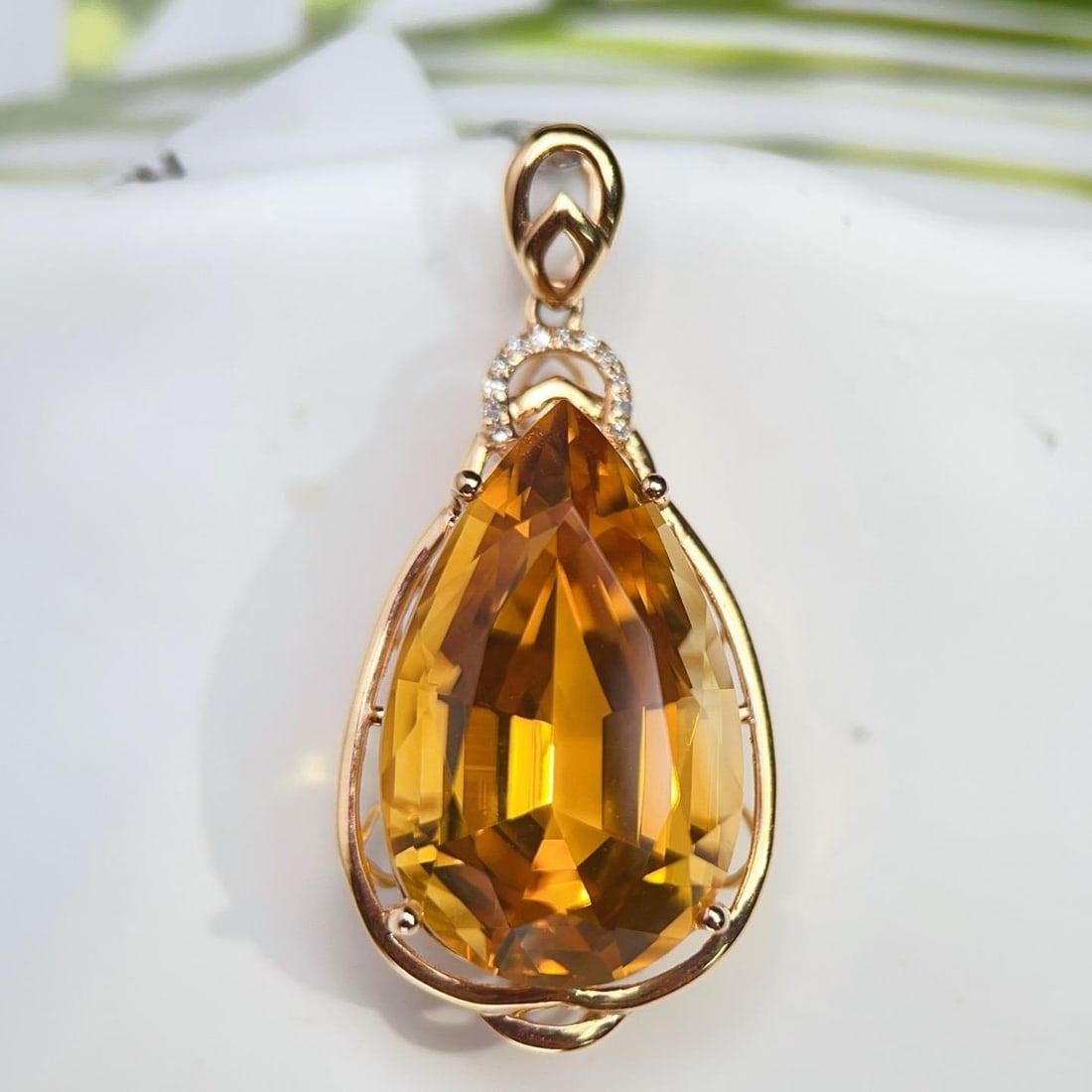 14k Gold 14.43 Ctw Natural Citrine & Diamond Pendant( Without Chain ): Ref:231192024 // gold content:14k gold // main gemstone:citrine // shape:pear // carat weight:14. 4ct // color:yellow // treatment:natural // // adjacent gemstone 2 : diamond // number of stones:12