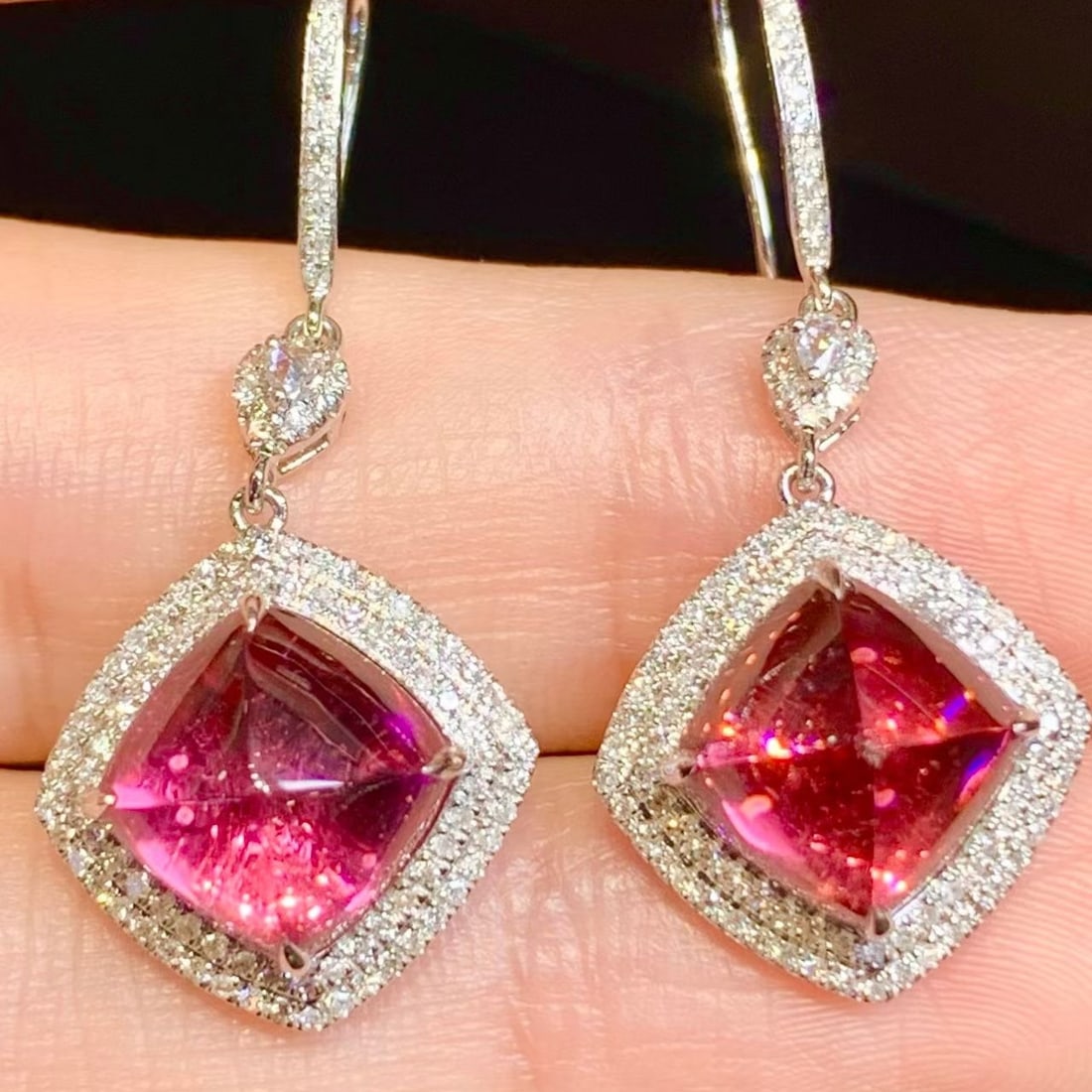 14k Gold 6.9 Ct Natural Tourmaline & Diamond Earrings: Ref:231192064 // gold content:14k gold // main gemstone:tourmaline // shape:sugar-loaf // carat weight:6. 9ct // color:red // treatment:natural // // adjacent gemstone 2 : diamond // shape:round //