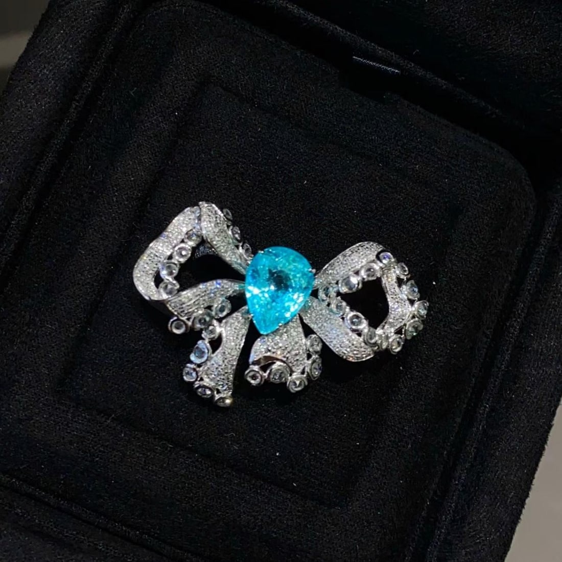 14k Gold 4.42 Ctw Natural Paraiba Tourmaline & Diamond Ring: Ref:231192065 // gold content:14k gold // ring size:7. 25us // // main gemstone:paraiba tourmaline // shape:pear // carat weight:3. 12ct // color:blue // treatment:natural // // adjacent gemstone 2 : 