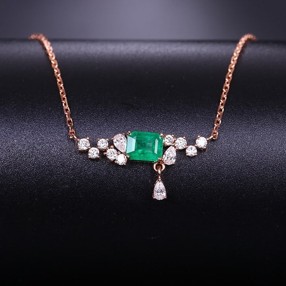 14k Gold 0.68 Ctw Vivid Green Natural Emerald & Diamond Necklace: Ref:231192078 // gold content:14k gold // main gemstone:emerald // shape:octagonal // carat weight:0. 41ct // color:vivid green // treatment:natural // // adjacent gemstone 2 : diamond //