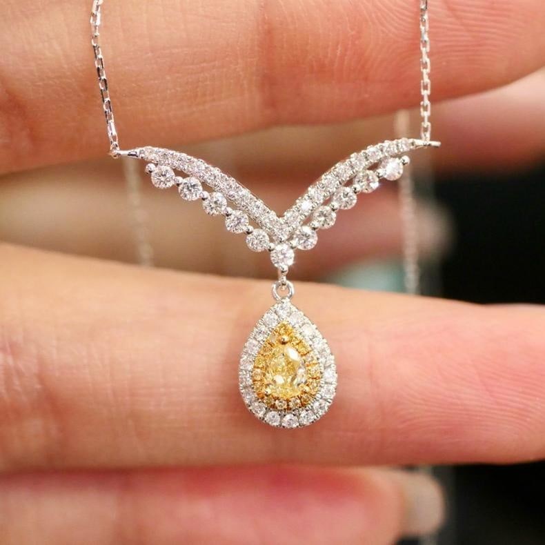 14k Gold 0.58 Ctw Natural Yellow Diamond & Diamond Necklace: Ref:231192089 // gold content:14k gold // main gemstone:yellow diamond // shape:pear // carat weight:0. 20ct // color:yellow // treatment:natural // // adjacent gemstone 2 : diamond // shape:round // 