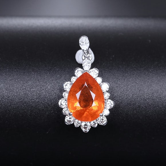 14k Gold 3.94 Ctw Natural Spessartine & Diamond Pendant( Without Chain ): Ref:231192104 // gold content:14k gold // main gemstone:spessartine // shape:pear // carat weight:3. 4ct // color:orange // treatment:natural // // adjacent gemstone 2 : diamond // shape:multiple //
