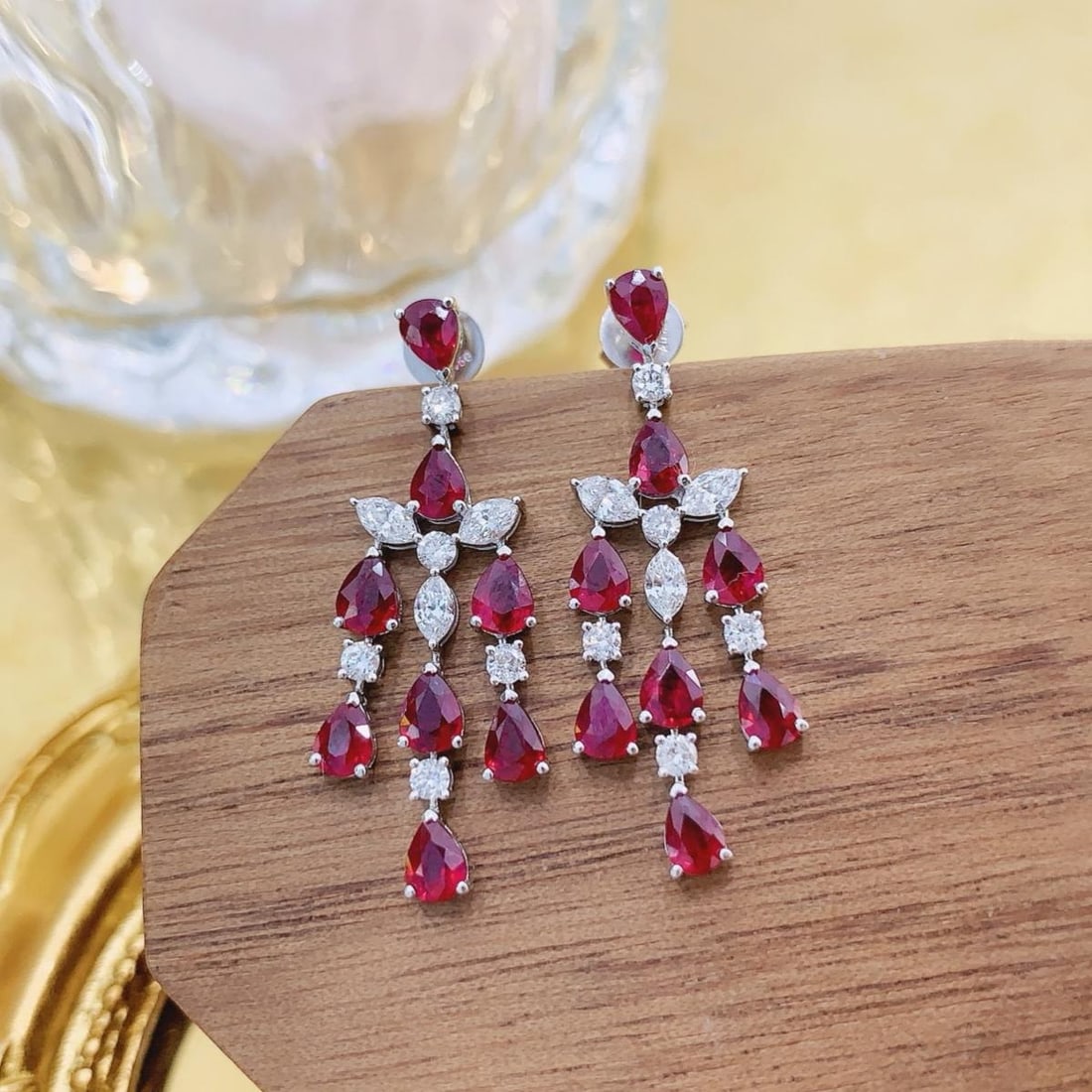 14k Gold 3.38 Ctw Natural Ruby & Diamond Earrings: Ref:231192120 // gold content:14k gold // main gemstone:ruby // shape:pear // carat weight:2. 72ct // color:red // treatment:natural // // adjacent gemstone 2 : diamond // shape:multiple // carat weig