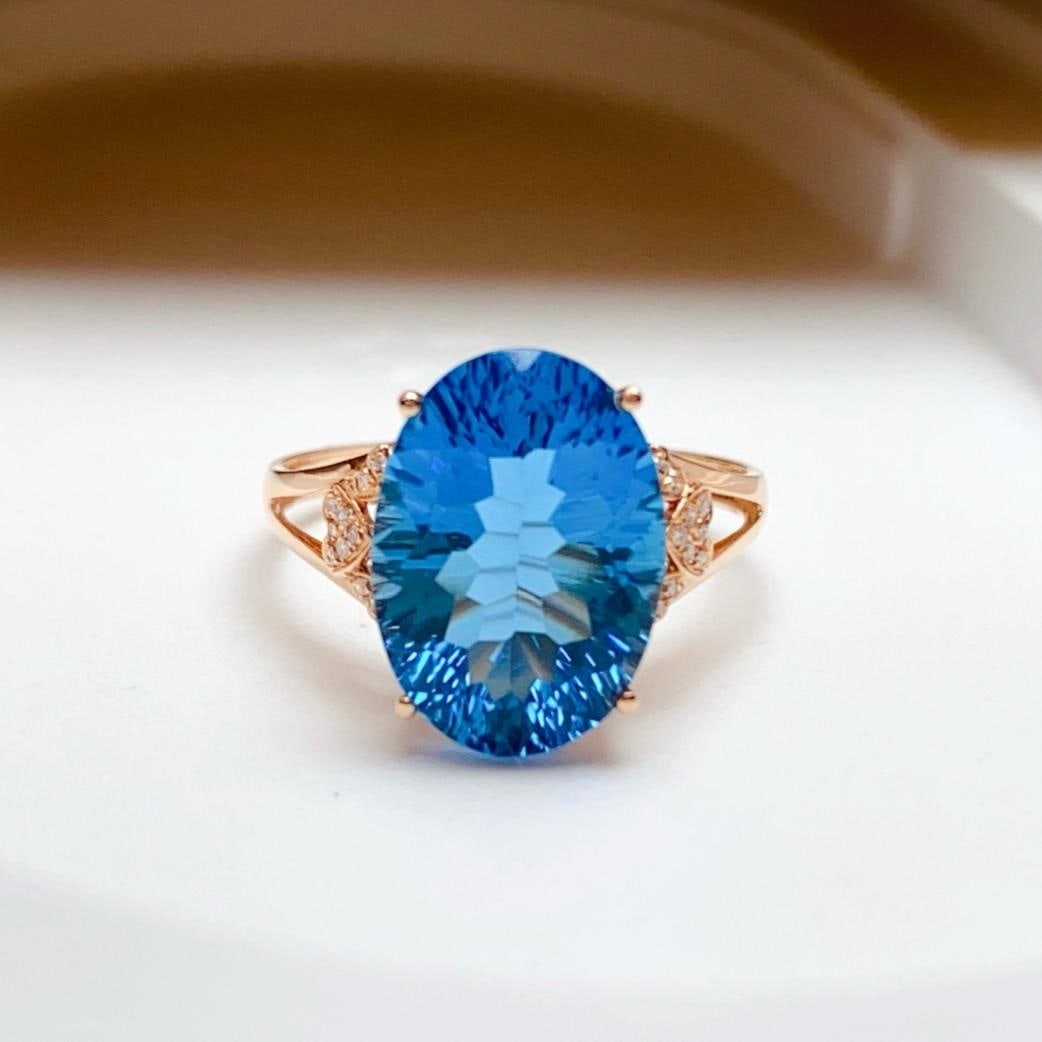 14k Gold 6.80 Ct Natural Topaz & Diamond Ring: Ref:231192138 // gold content:14k gold // ring size:7. 25us // // main gemstone:topaz // shape:oval // carat weight:6. 80ct // color:blue // treatment:natural // // adjacent gemstone 2 : diamond // nu