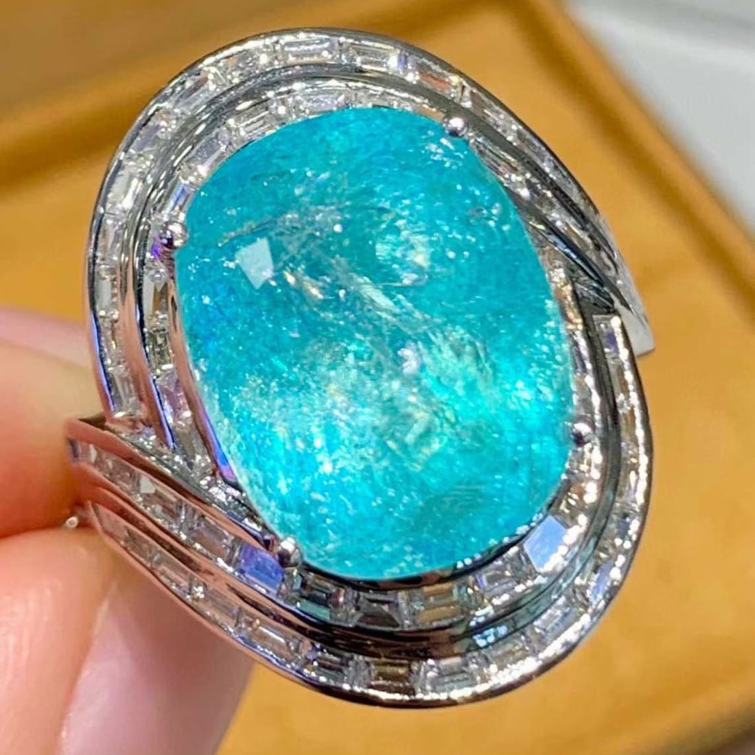 14k Gold 10.73 Ct Natural Paraiba Tourmaline & Diamond Ring: Ref:231192142 // gold content:14k gold // ring size:7. 25us // // main gemstone:paraiba tourmaline // shape:oval // carat weight:10. 73ct // color:blue // treatment:natural // // adjacent gemstone 2