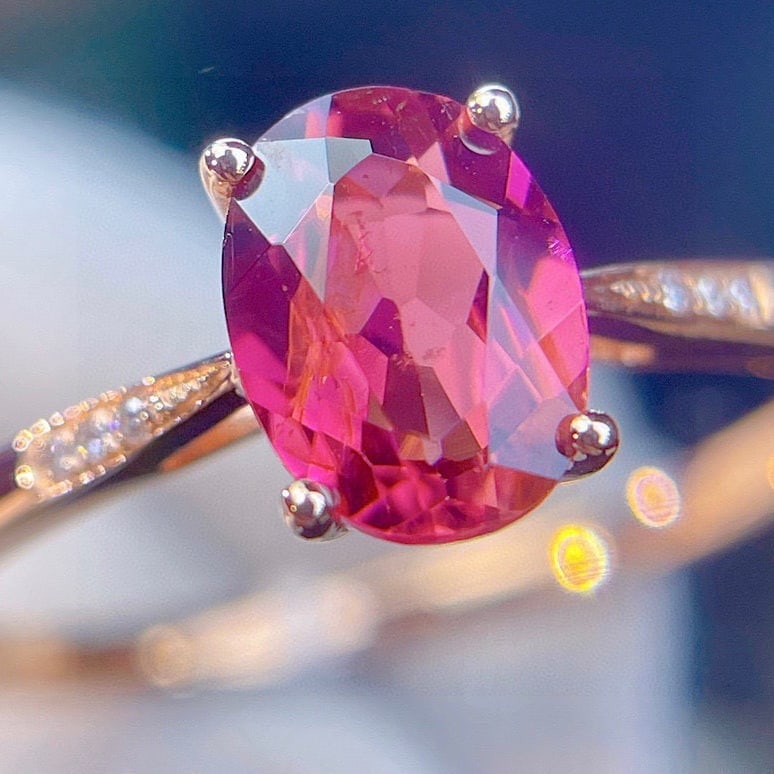 14k Gold 1.25 Ct Natural Tourmaline & Diamond Ring: Ref:231192144 // gold content:14k gold // ring size:7. 25us // // main gemstone:tourmaline // shape:oval // carat weight:1. 25ct // color:red // treatment:natural // // adjacent gemstone 2 : diamond /