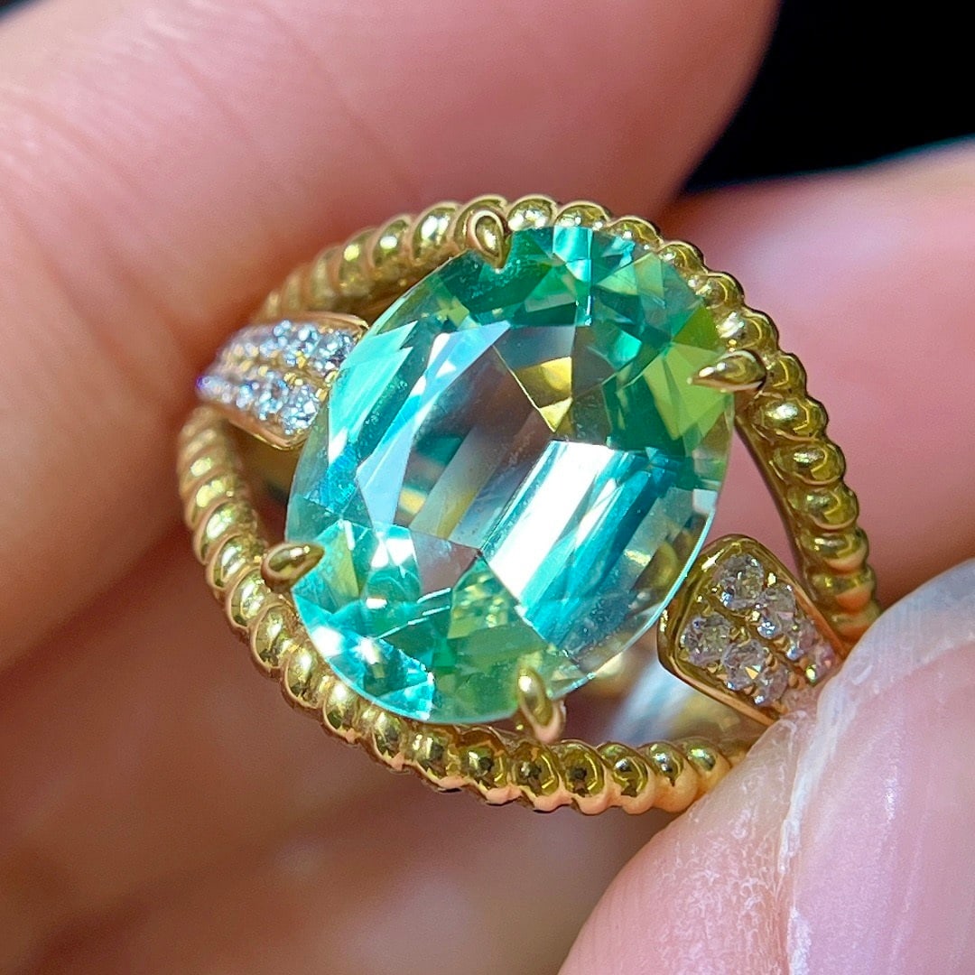 14k Gold 4.76 Ctw Natural Tourmaline & Diamond Ring: Ref:231192146 // gold content:14k gold // ring size:7. 25us // // main gemstone:tourmaline // shape:oval // carat weight:4. 55ct // color:green // treatment:natural // // adjacent gemstone 2 : diamond