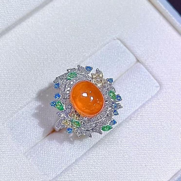 14k Gold 4.61 Ctw Natural Spessartine & Coloured Gemstone Ring: Ref:231192150 // gold content:14k gold // ring size:7. 25us // // main gemstone:spessartine // shape:oval // carat weight:4. 25ct // color:orange // treatment:natural // // adjacent gemstone 2 :