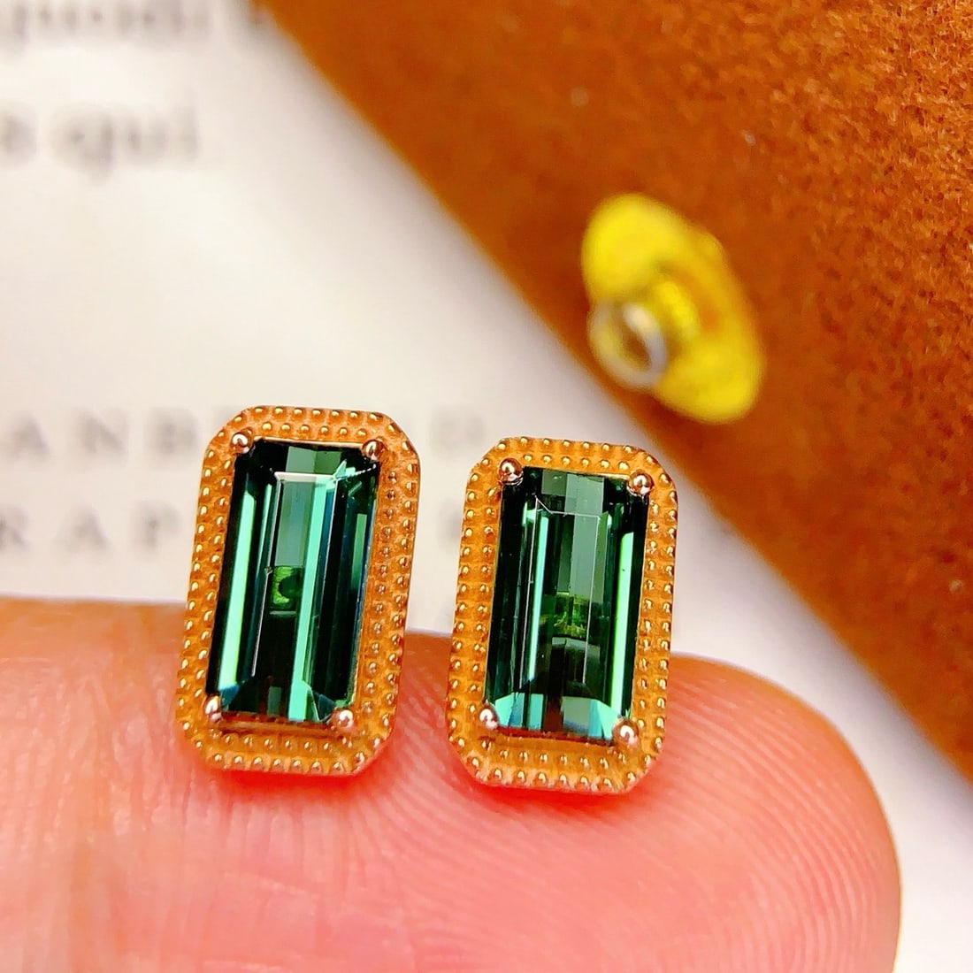 14k Gold 2 Ct Natural Tourmaline Earrings: Ref:231192191 // gold content:14k gold // main gemstone:tourmaline // shape:octagonal // carat weight:2ct // color:green // treatment:natural // Condition: New Low Estimate: 2600.00 High Estimate: 400