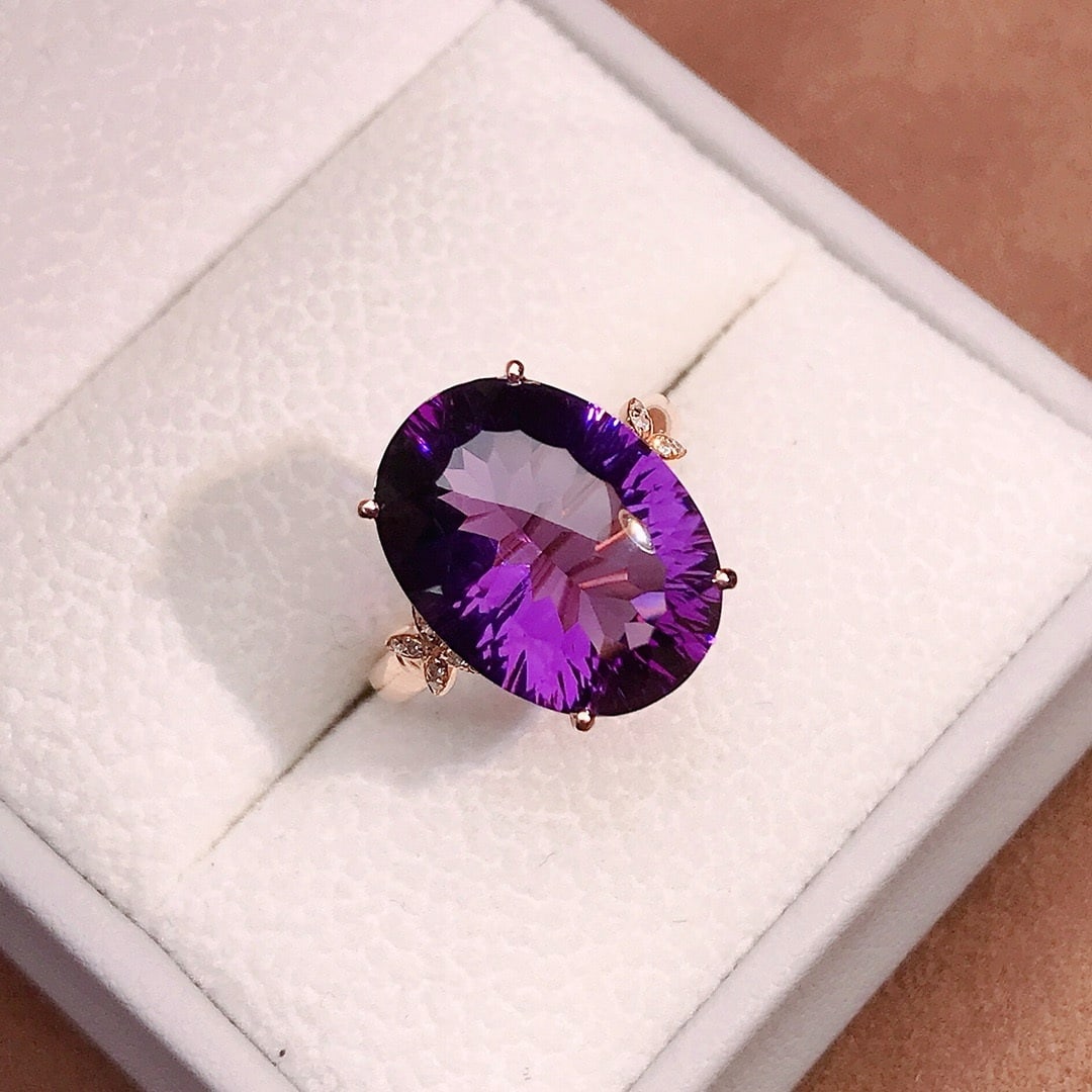 14k Gold 7.10 Ctw Natural Amethyst & Diamond Ring: Ref:231192198 // gold content:14k gold // ring size:7. 25us // // main gemstone:amethyst // shape:oval // carat weight:7. 05ct // color:purple // treatment:natural // // adjacent gemstone 2 : diamond