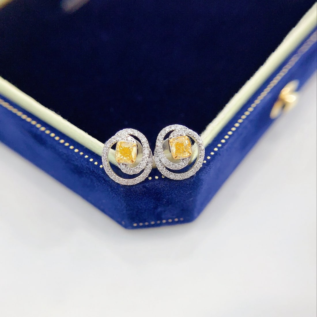 14k Gold 0.52 Ctw Natural Yellow Diamond & Diamond Earrings: Ref:231192216 // gold content:14k gold // main gemstone:yellow diamond // shape:cushion // carat weight:0. 34ct // color:yellow // treatment:natural // // adjacent gemstone 2 : diamond // shape:round 