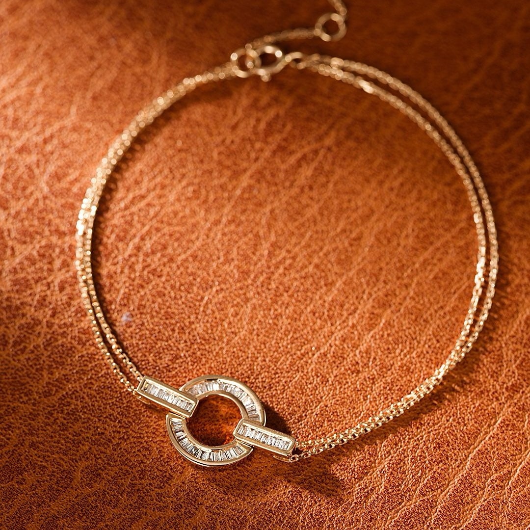 14k Gold 0.17 Ct Natural H Diamond Bracelet: Ref:231192220 // gold content:14k gold // main gemstone:diamond // shape:baguette // carat weight:0. 17ct // clarity grade:vs-si // color:h // treatment:natural // Condition: New Low Estimate: