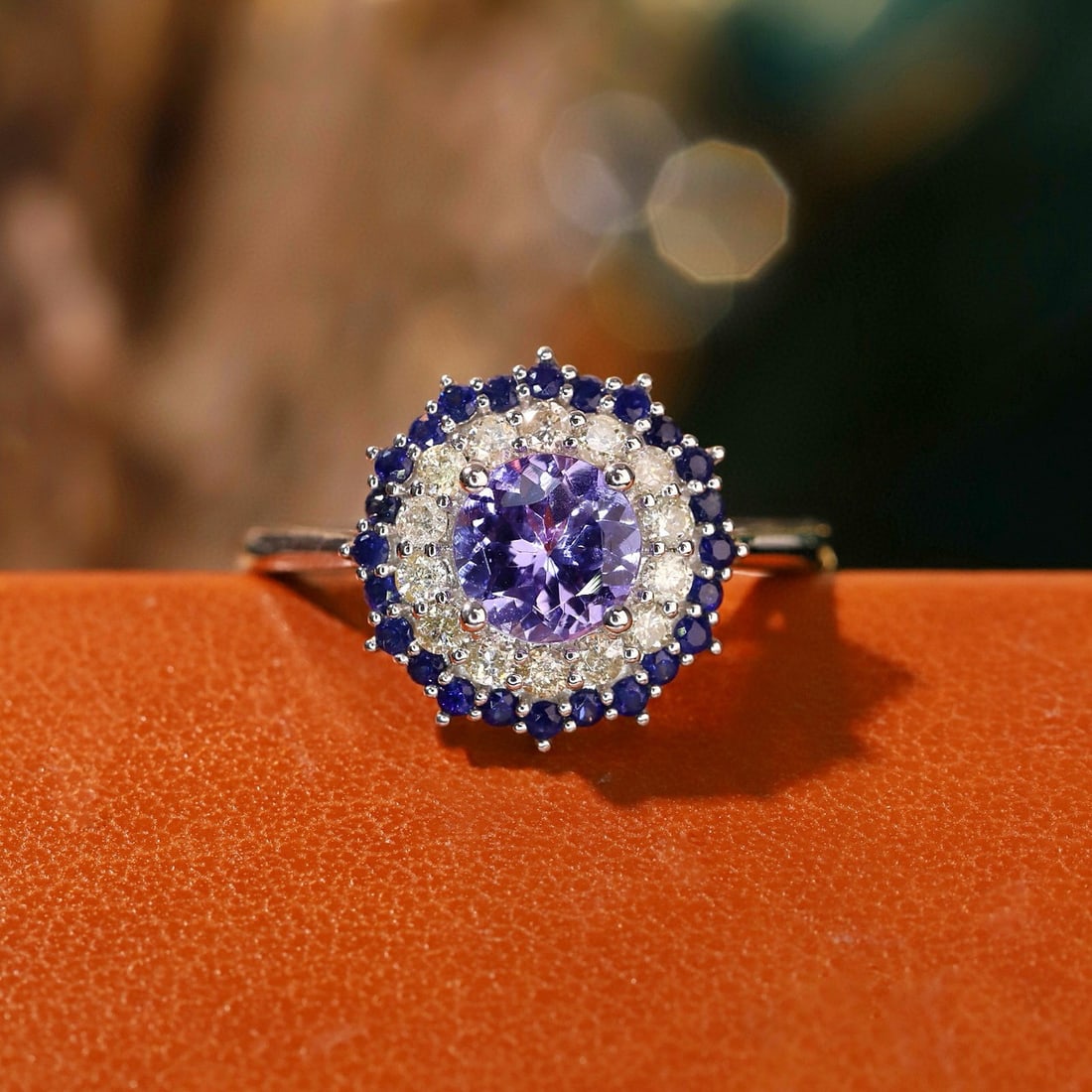 14k Gold 1.06 Ctw Natural Tanzanite & Diamond Ring: Ref:231192288 // gold content:14k gold // ring size:7. 25us // // main gemstone:tanzanite // shape:round // carat weight:0. 76ct // color:purplish blue // treatment:natural // cut grade:g // // adjace