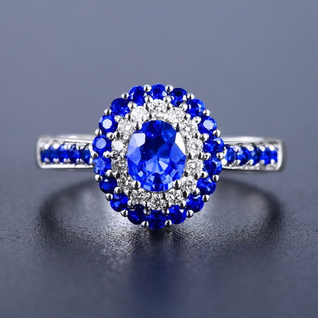 14k Gold 0.97 Ctw Natural Sapphire & Sapphire Ring: Ref:231192306 // gold content:14k gold // ring size:7. 25us // // main gemstone:sapphire // shape:oval // carat weight:0. 55ct // color:blue // treatment:natural // // adjacent gemstone 2 : sapphire