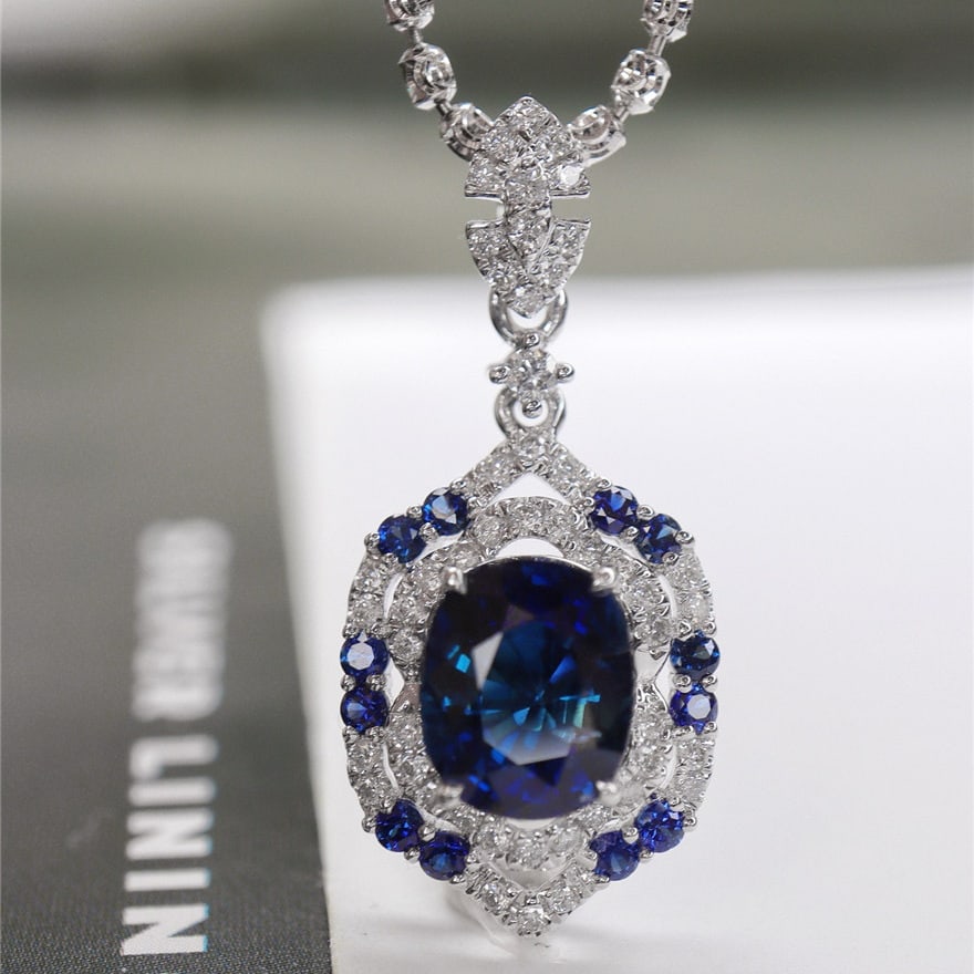 14k Gold 2.17 Ctw Natural Sapphire & Diamond Pendant( Without Chain ): Ref:231192314 // gold content:14k gold // main gemstone:sapphire // shape:oval // carat weight:1. 9ct // color:blue // treatment:natural // // adjacent gemstone 2 : diamond // shape:round // carat