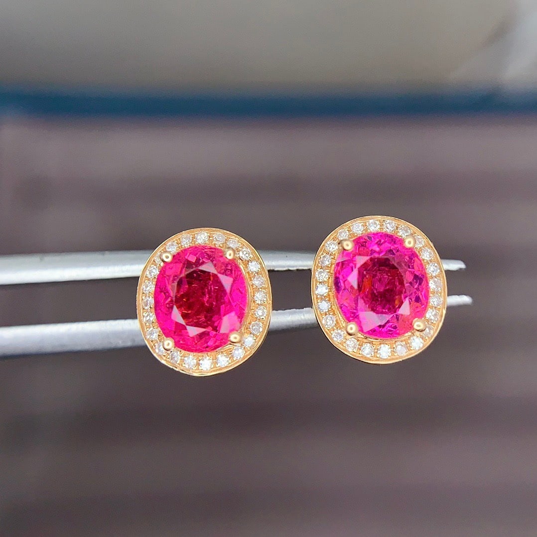 14k Gold 1.8 Ct Natural Tourmaline & Diamond Earrings: Ref:231192335 // gold content:14k gold // main gemstone:tourmaline // shape:oval // carat weight:1. 8ct // color:red // treatment:natural // // adjacent gemstone 2 : diamond // shape:round // clarity 