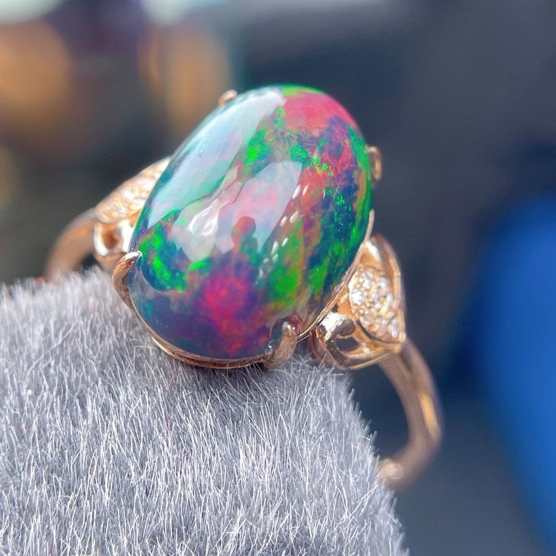 14k Gold 3.5 Ct Natural Opal & Diamond Ring: Ref:231192409 // gold content:14k gold // ring size:7. 25us // // main gemstone:opal // shape:oval // carat weight:3. 5ct // color:color // treatment:natural // // adjacent gemstone 2 : diamond // sha