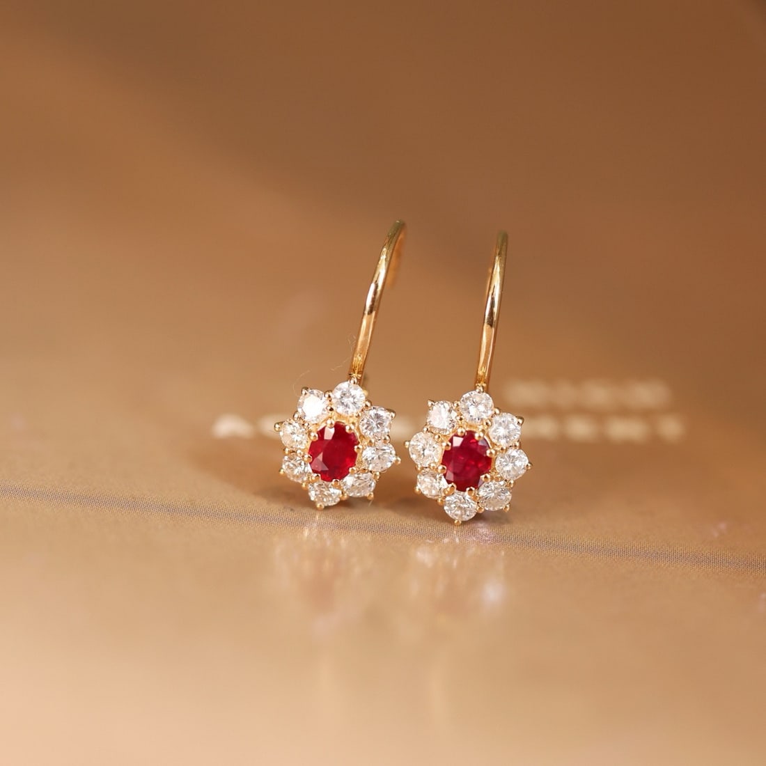 14k Gold 1.32 Ctw Vivid Red Natural Ruby & Diamond Earrings: Ref:231192416 // gold content:14k gold // main gemstone:ruby // shape:oval // carat weight:0. 52ct // color:vivid red // treatment:natural // // adjacent gemstone 2 : diamond // shape:round // carat w