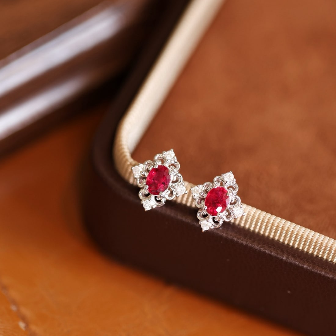 14k Gold 0.82 Ctw Vivid Red Natural Ruby & Diamond Earrings: Ref:231192419 // gold content:14k gold // main gemstone:ruby // shape:oval // carat weight:0. 7ct // color:vivid red // treatment:natural // // adjacent gemstone 2 : diamond // shape:round // carat we